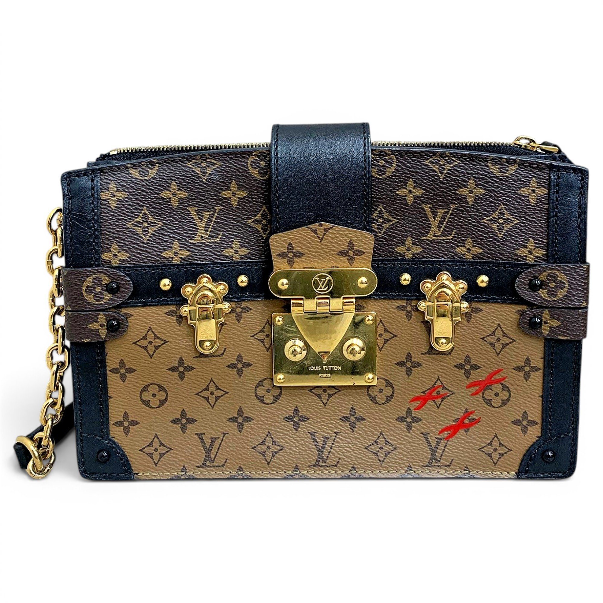 Pochette Trunk leather handbag