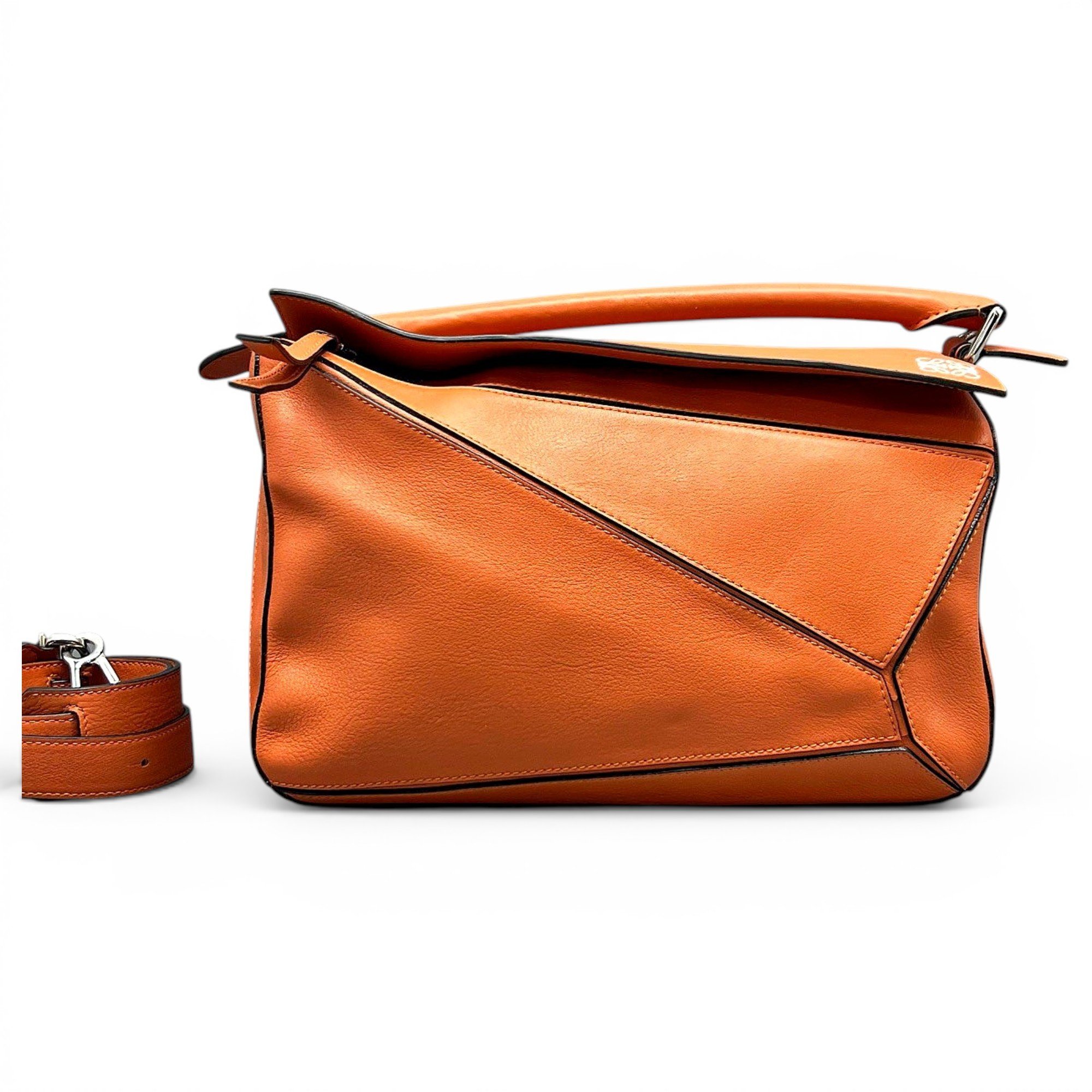 Puzzle leather handbag