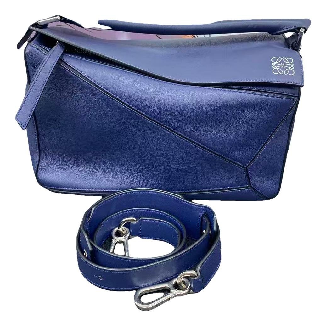 Puzzle leather handbag