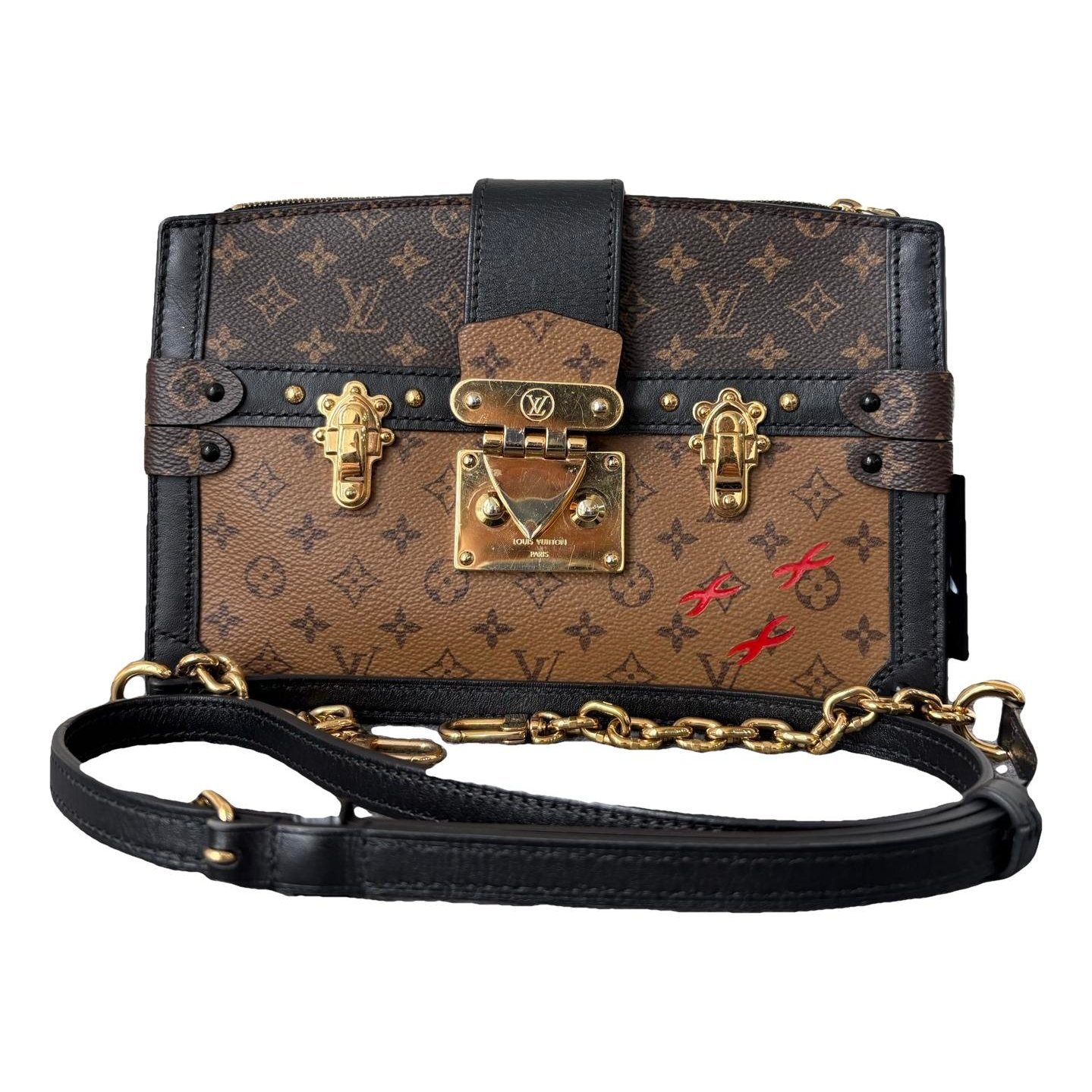 Pochette Trunk leather handbag