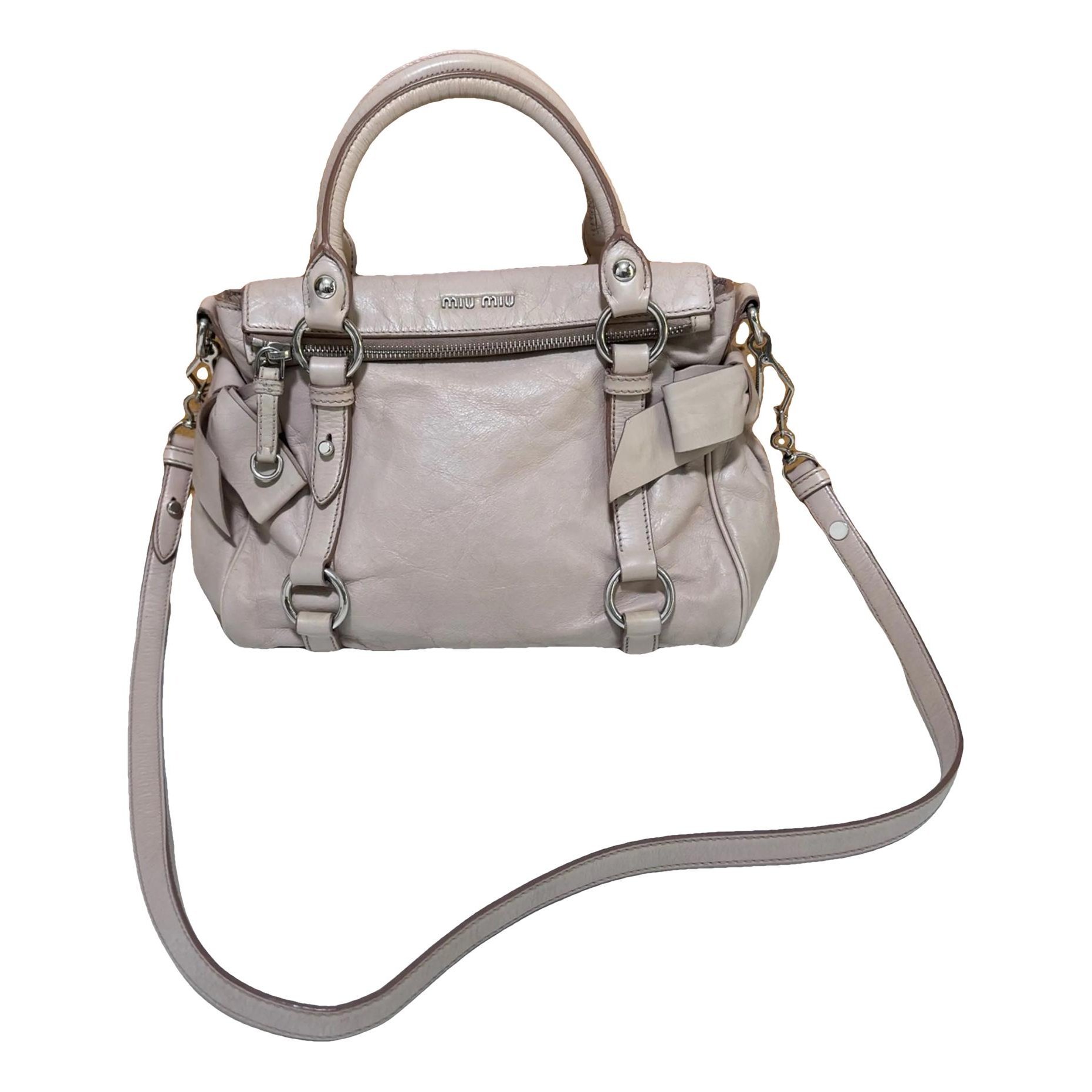 Bow bag leather handbag