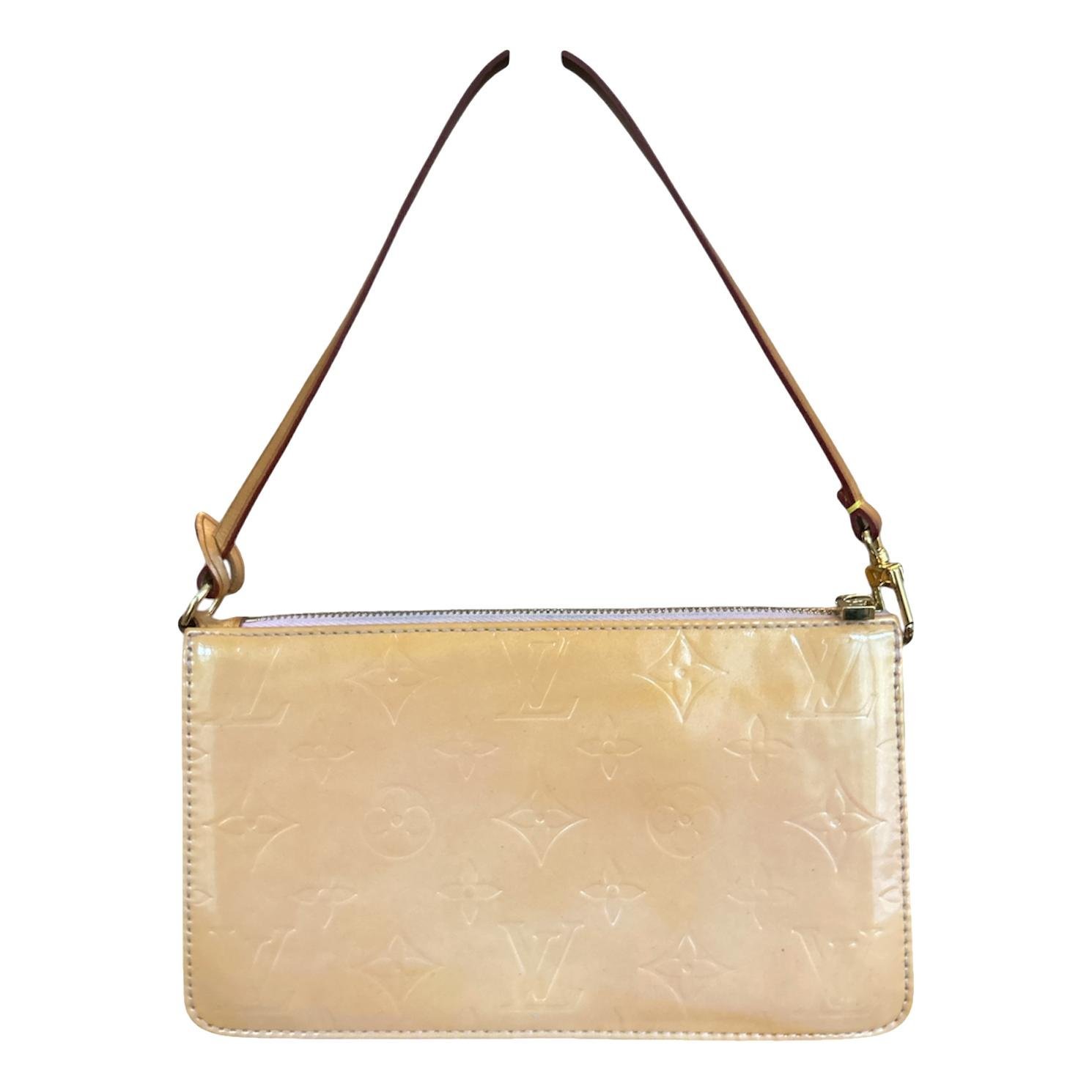 Pochette Accessoire patent leather handbag