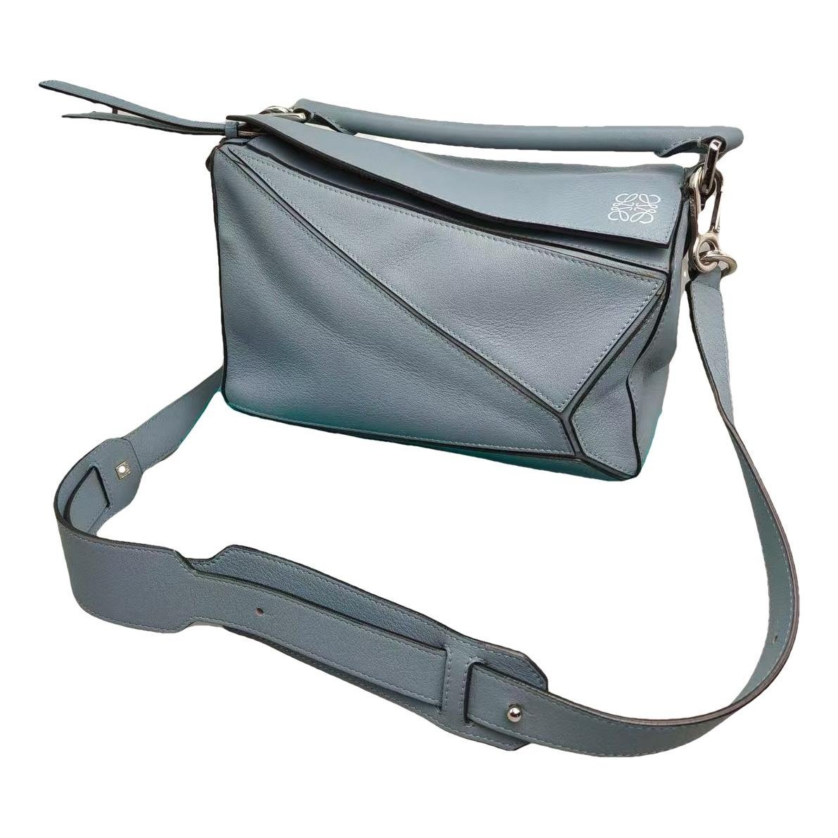 Puzzle leather handbag