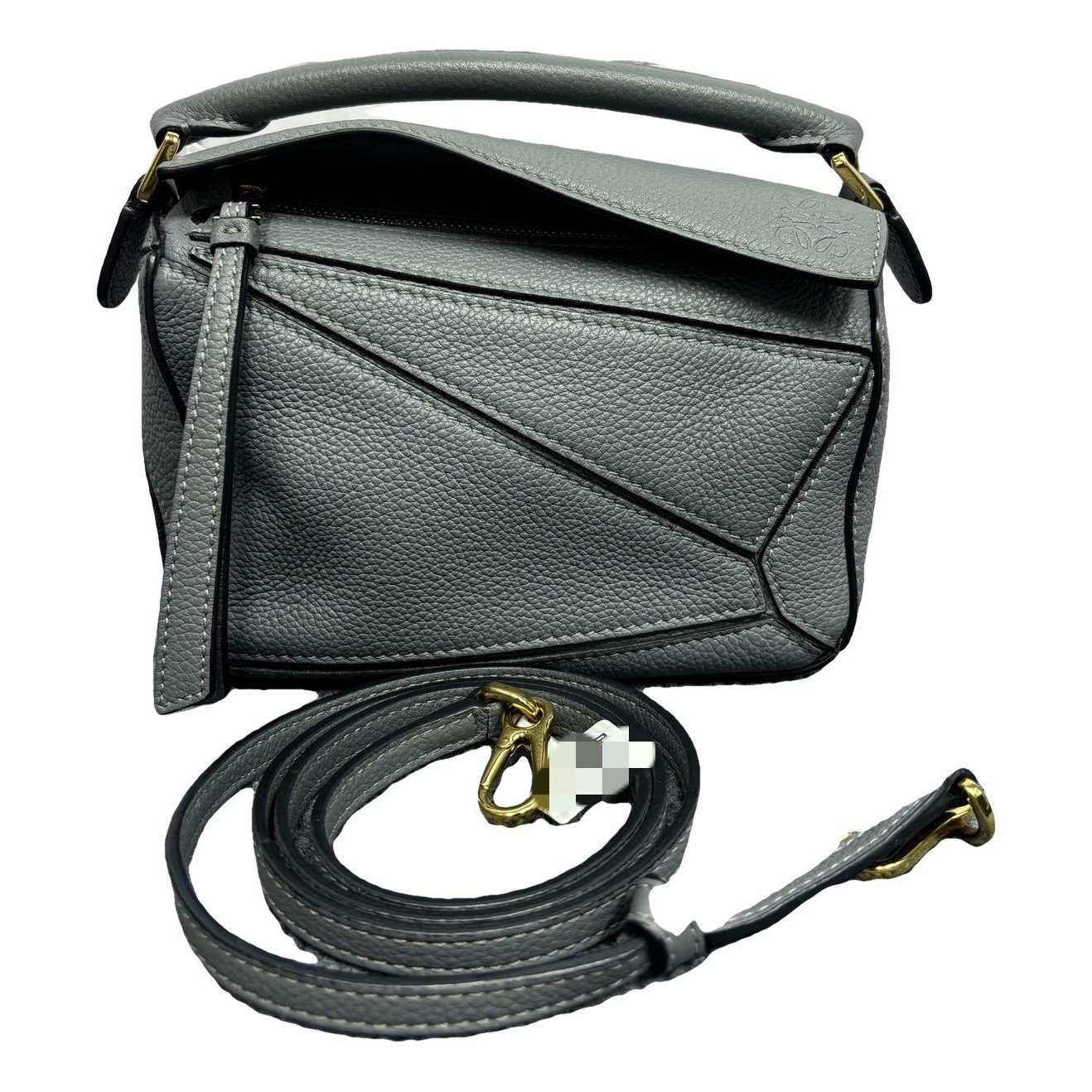 Puzzle leather handbag
