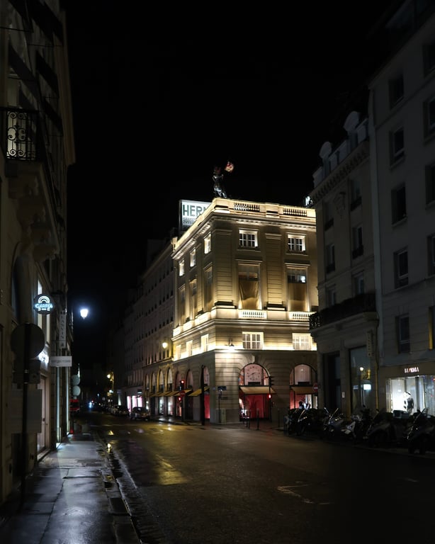 Hermès flagship store at 24 Faubourg Saint-Honoré, Paris, illuminated at night
