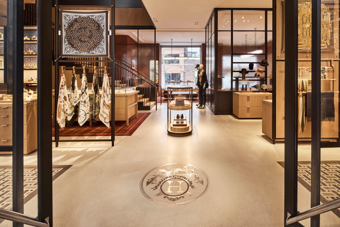 Silk scarves, accessories and display cabinets inside the permanent Hermès Williamsburg boutique
