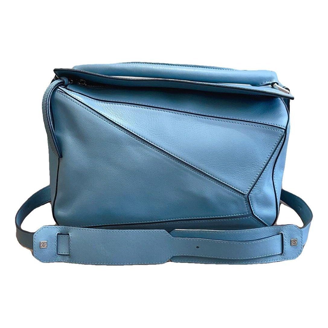 Puzzle leather handbag