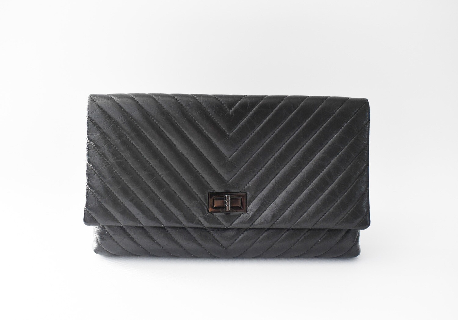 Chanel Chanel Reissue 2.55 Flap Clutch, So Black Chevron Aged Calfskin Leather with So Black Hardware, Preowned in Dustbag GA001