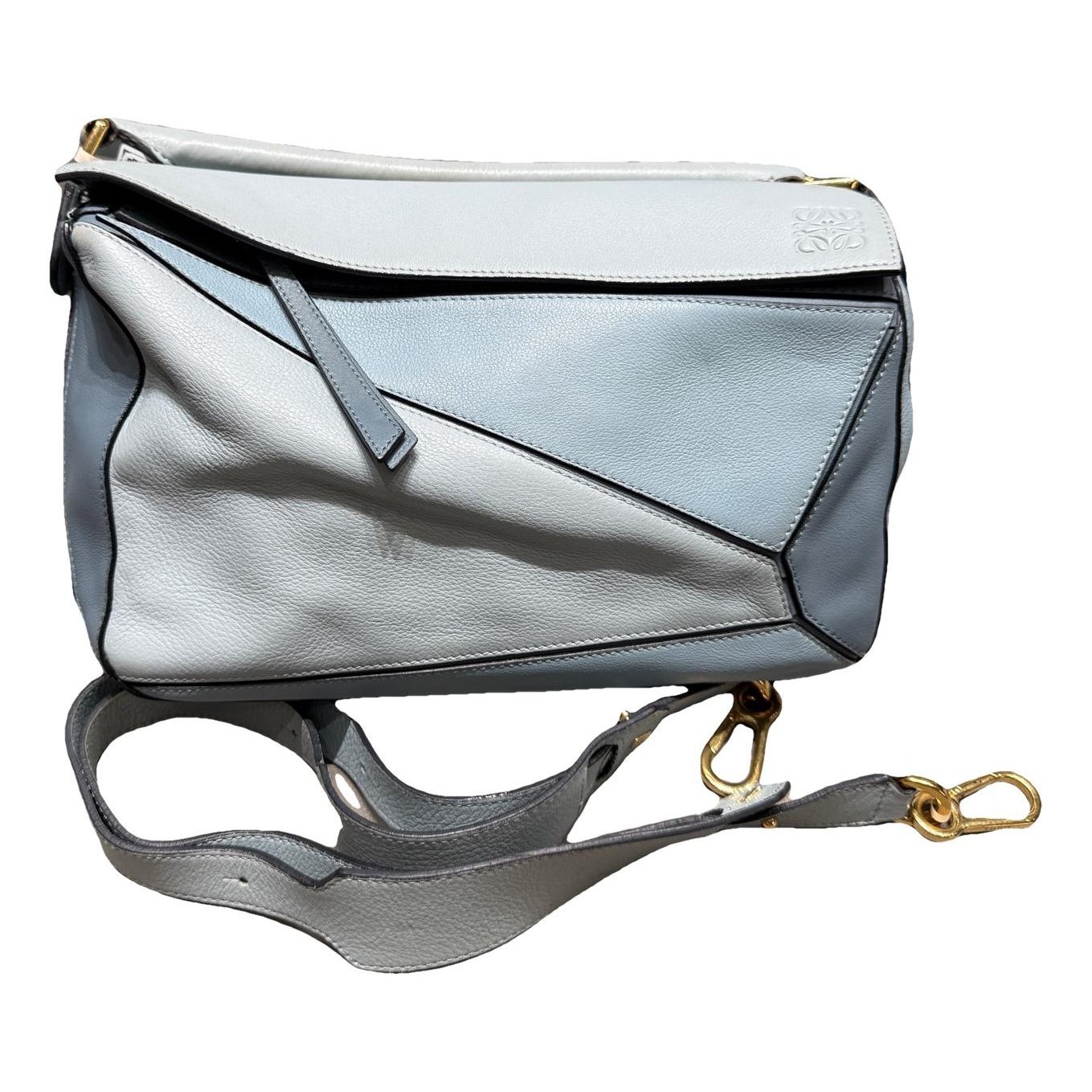 Puzzle leather handbag