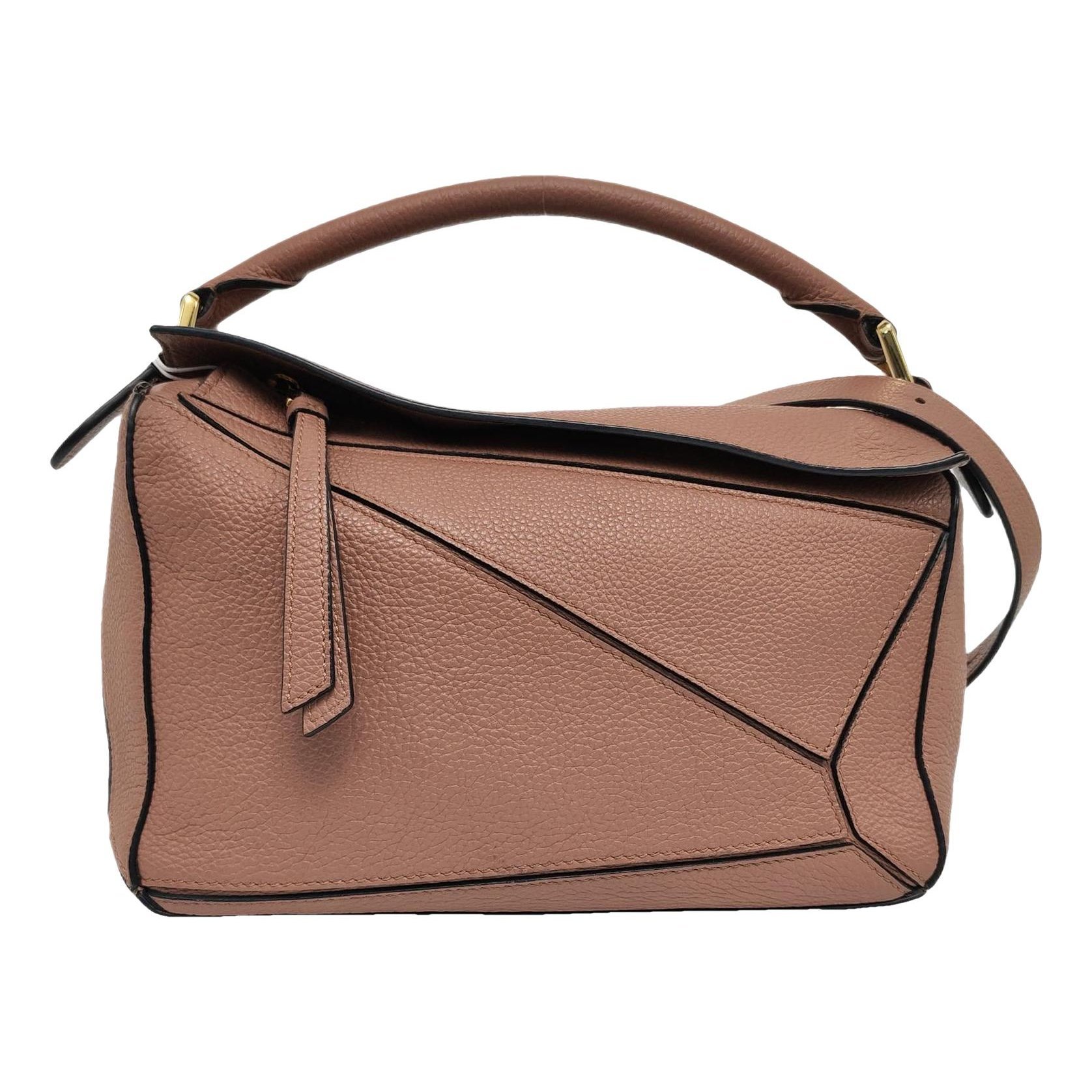 Puzzle leather handbag