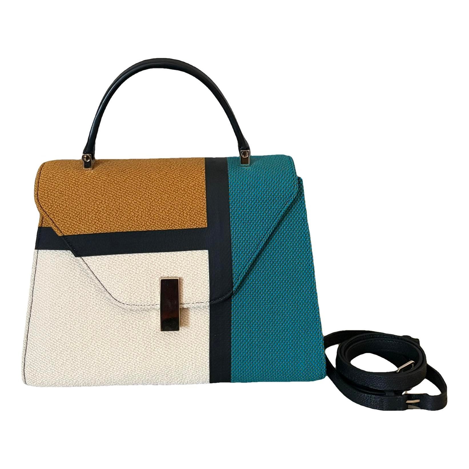 Iside leather handbag