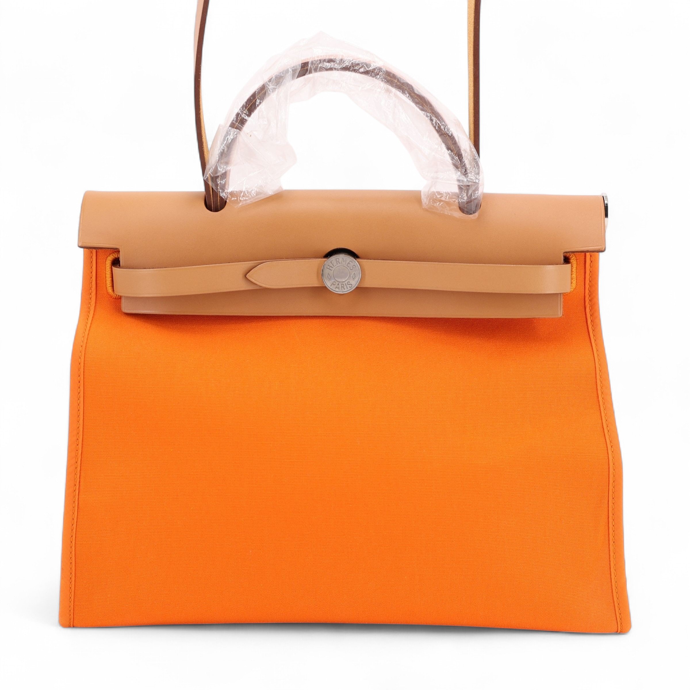 Unused ( Rank NS ) HERMÈS Herbag Zip 31 PM Orange (93) Vache Hunter Canvas Palladium hardware Square Q (2013)