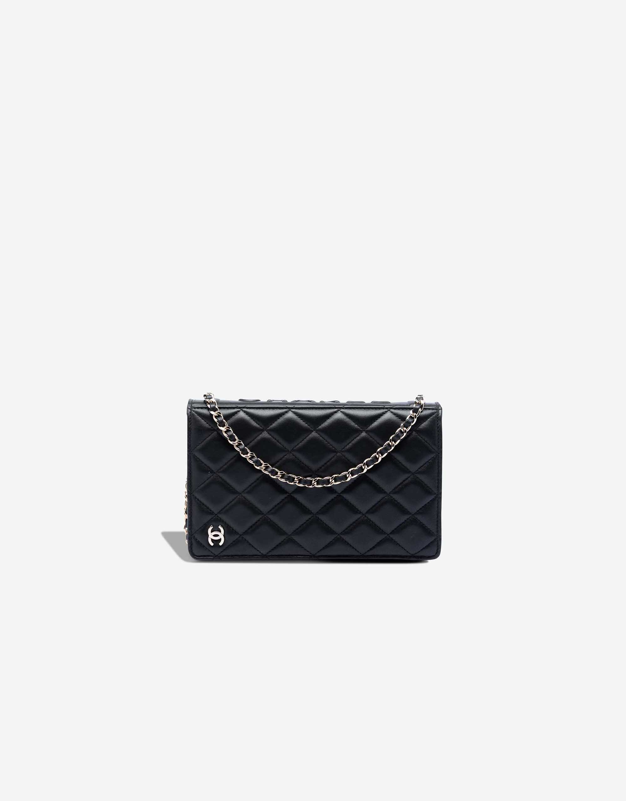 
		Wallet On Chain Lamb Black / White    