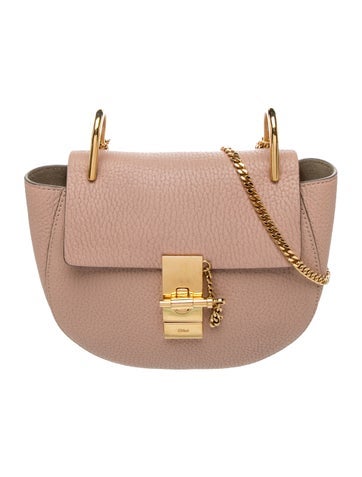 Piston Lock Crossbody Bag