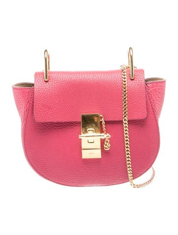 Piston Lock Crossbody Bag