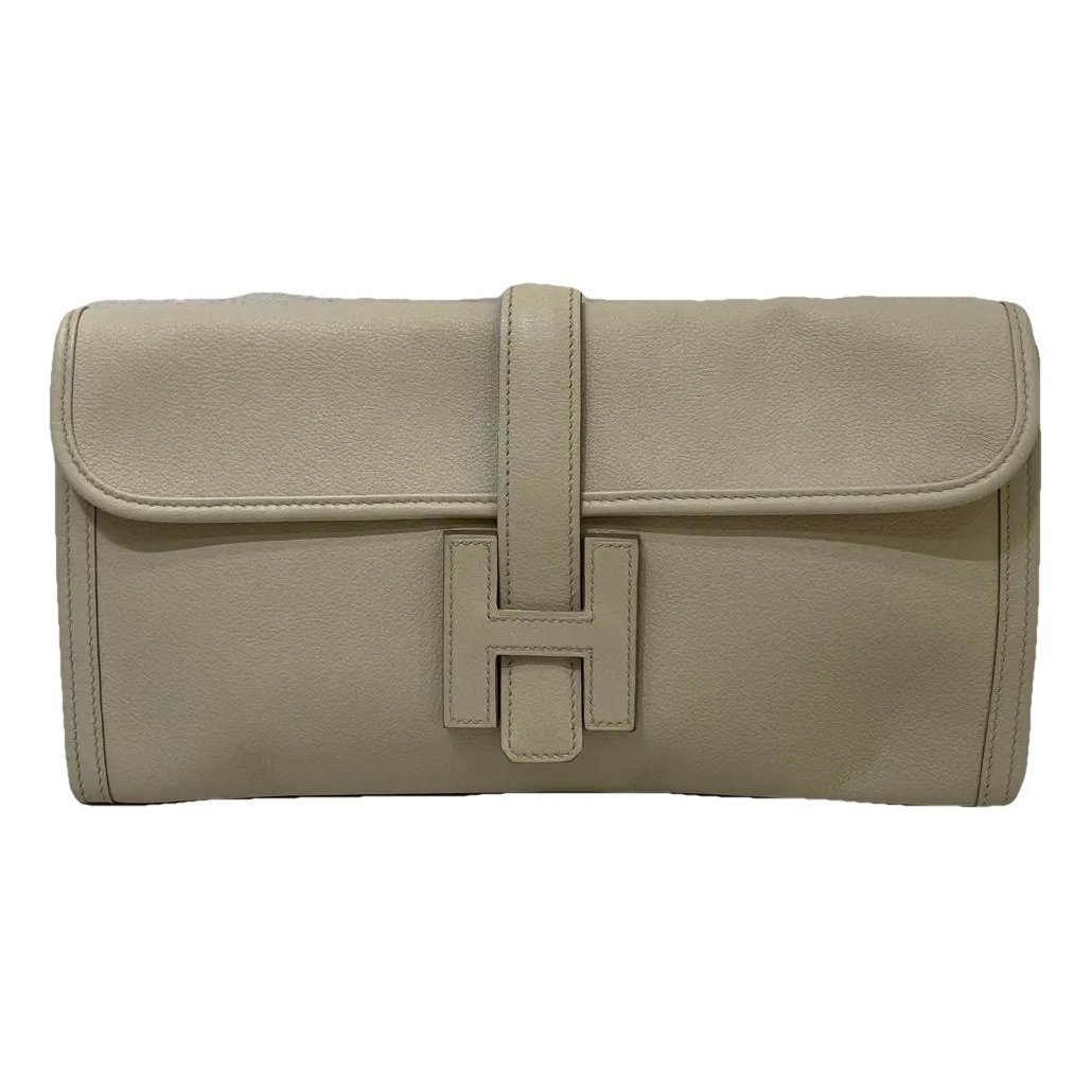 Jige leather clutch bag