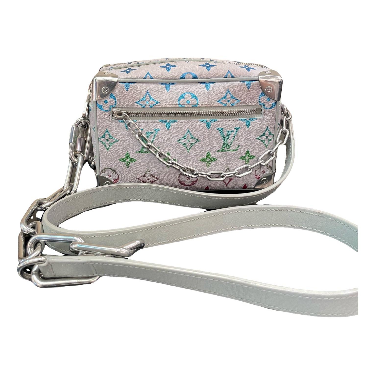 Pochette Trunk leather handbag