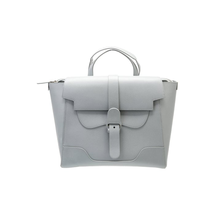 Senreve full-size Maestra in dove grey pebbled leather, shown with the side zip gussets open to widen the bag