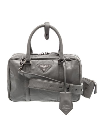 Enameled Metal Triangle Top Handle Bag