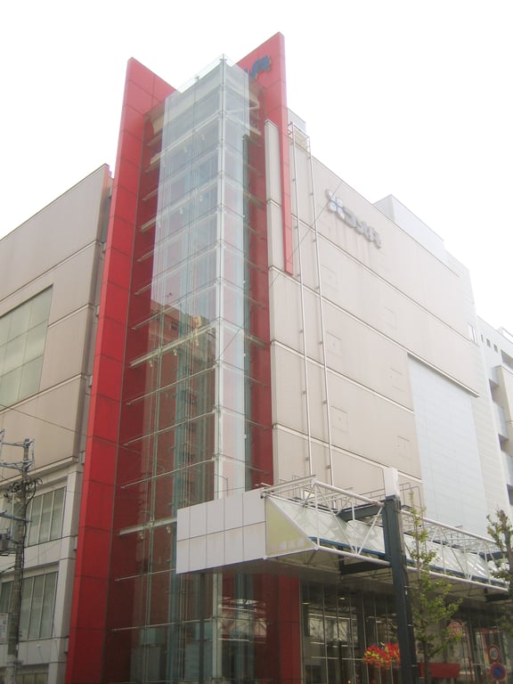 Komehyo store exterior — Japan's largest luxury resale chain