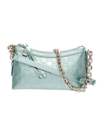 GG Canvas GG Emblem Crossbody Bag