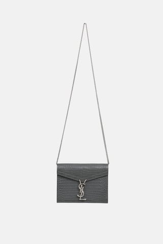 Embossed Cassandre Clutch