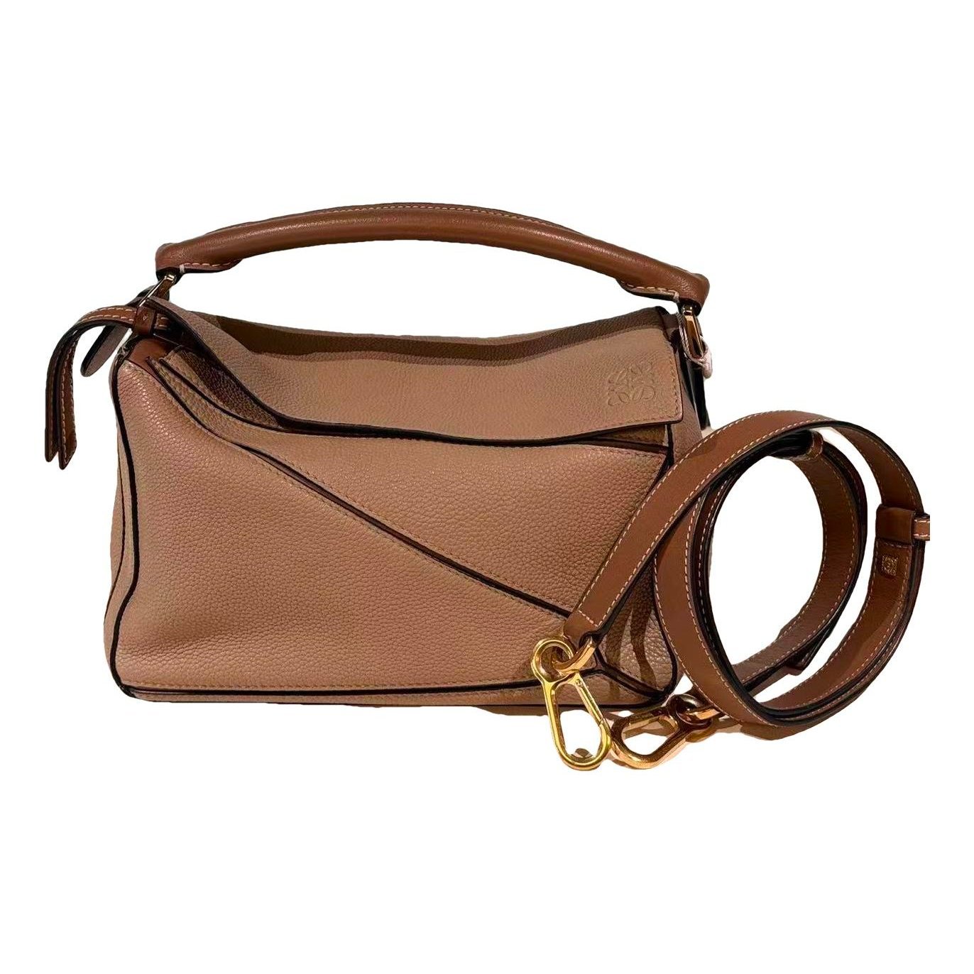Puzzle leather handbag