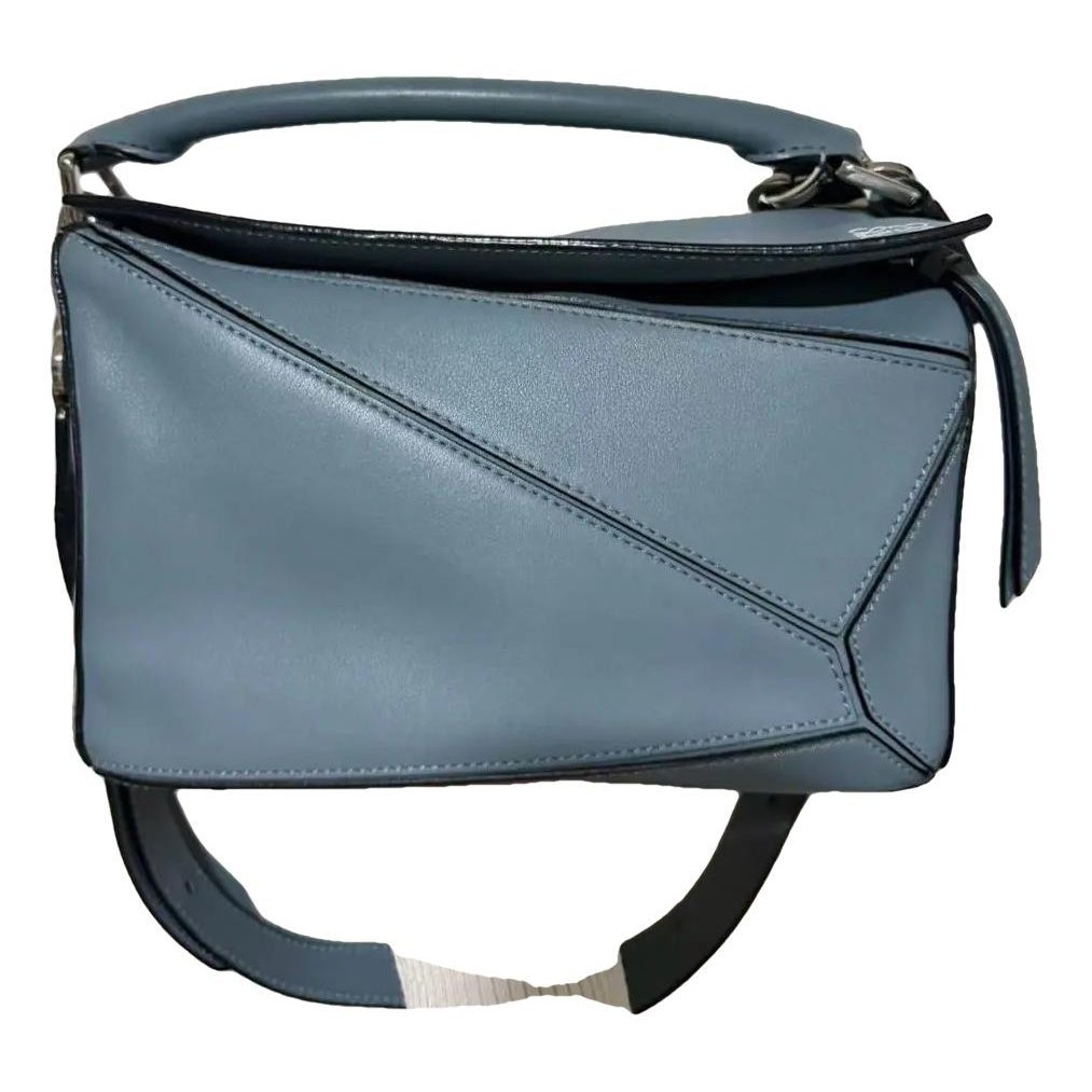 Puzzle leather crossbody bag