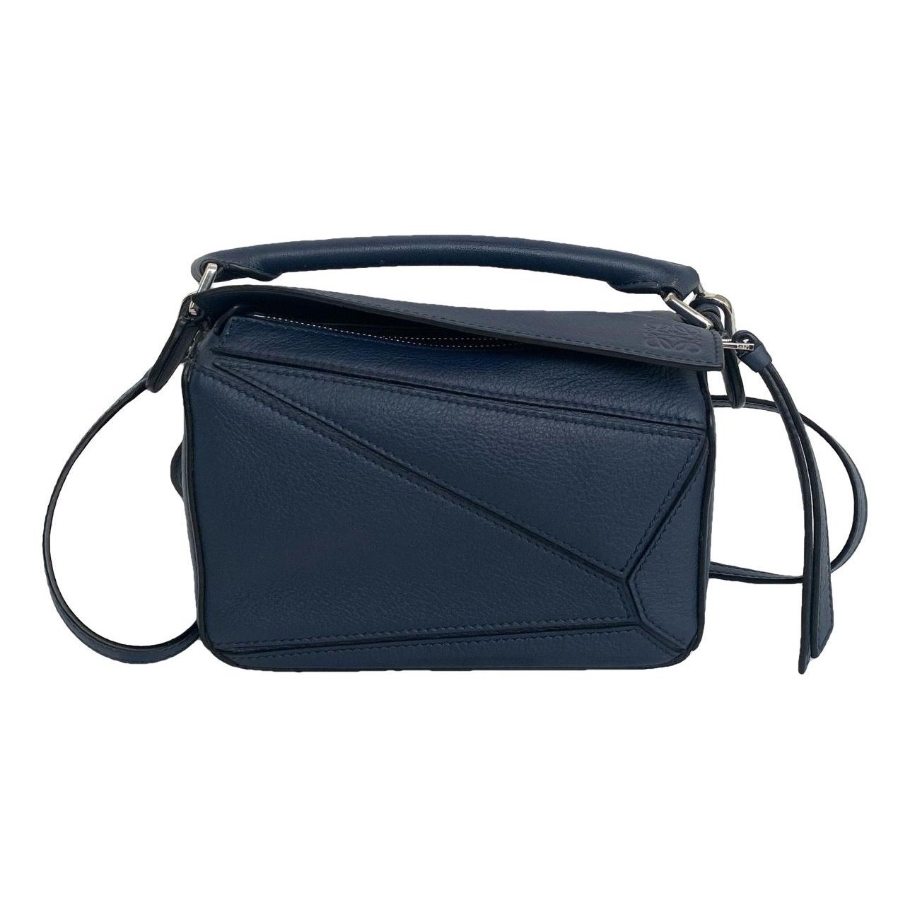 Puzzle leather handbag