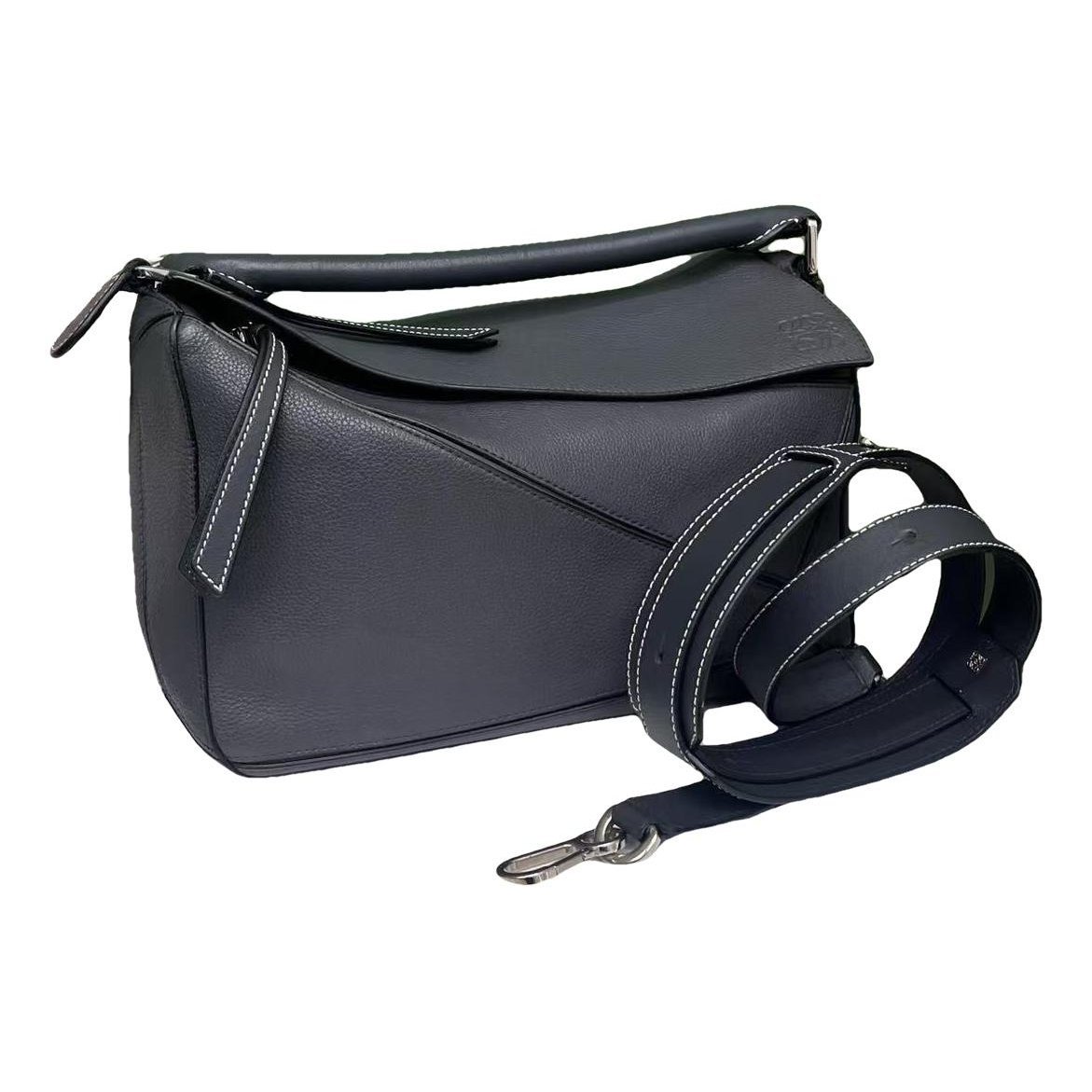 Puzzle leather handbag