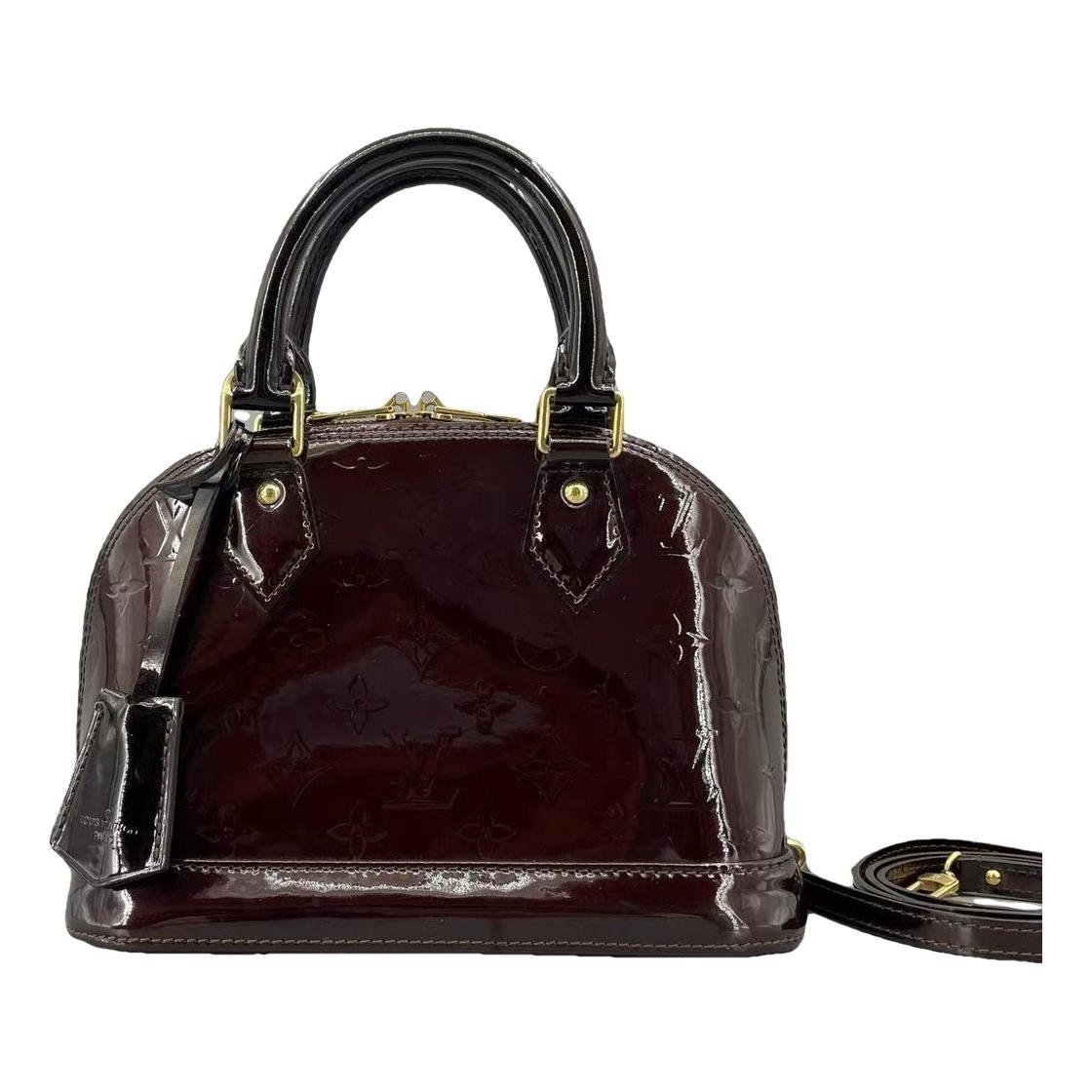 Alma patent leather handbag