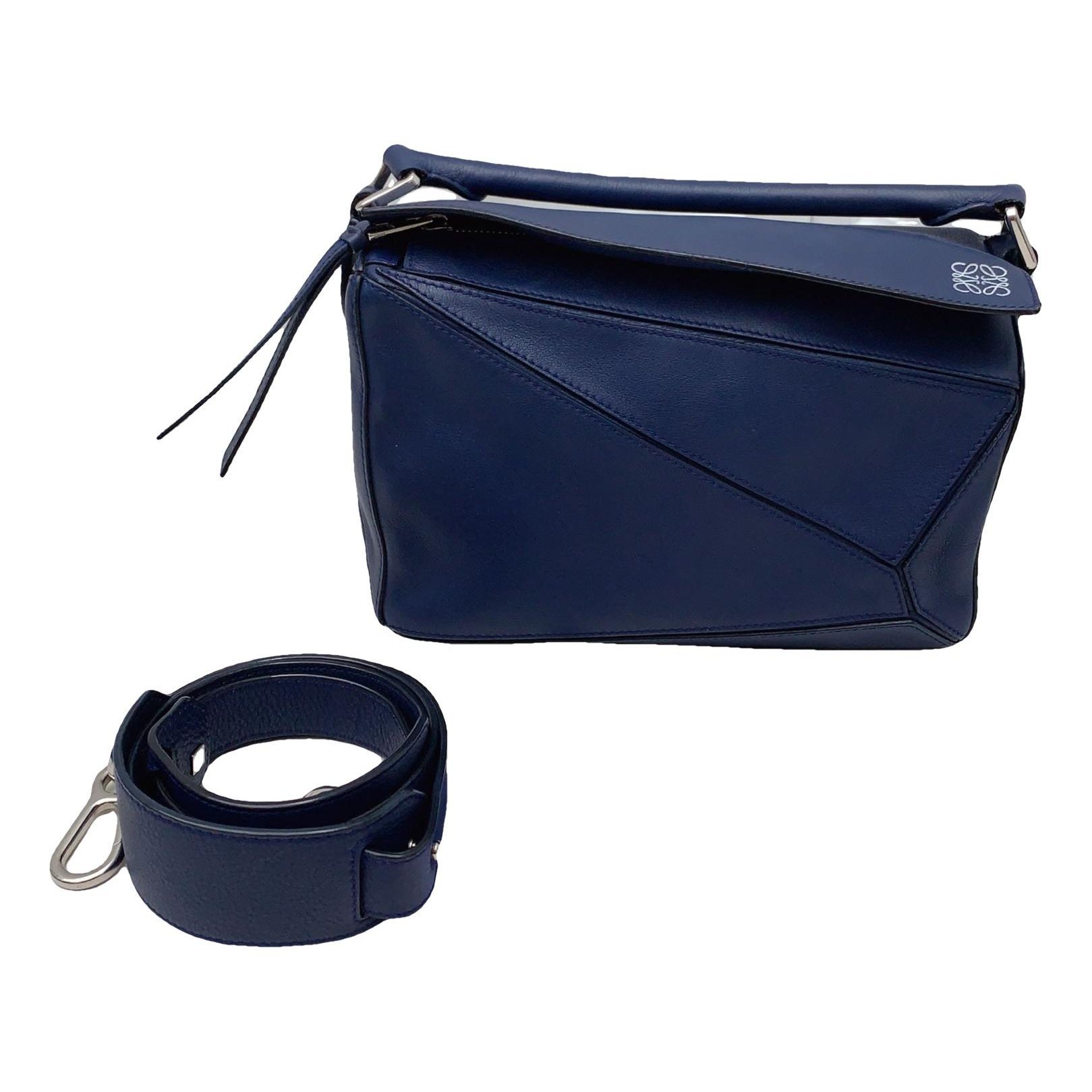 Puzzle leather handbag