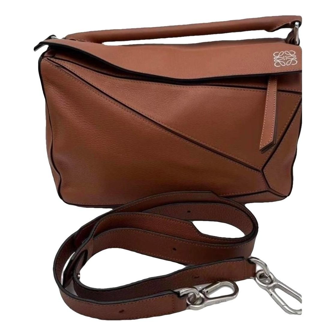 Puzzle leather handbag