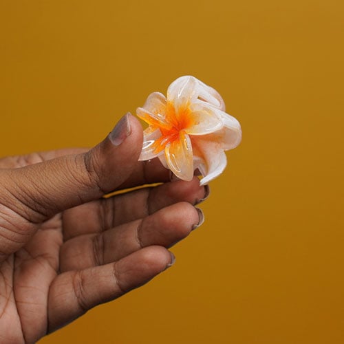 Glossy Plumeria Flower Shape Hair Clip - Orange