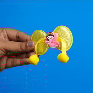 Shiny Bow Shape Pompom Hair Clip - Yellow