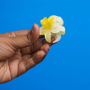 Glossy Plumeria Flower Shape Hair Clip - Yellow