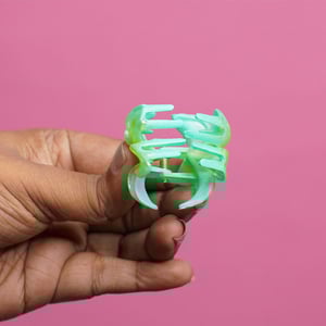 Glossy Plumeria Flower Shape Hair Clip - Green