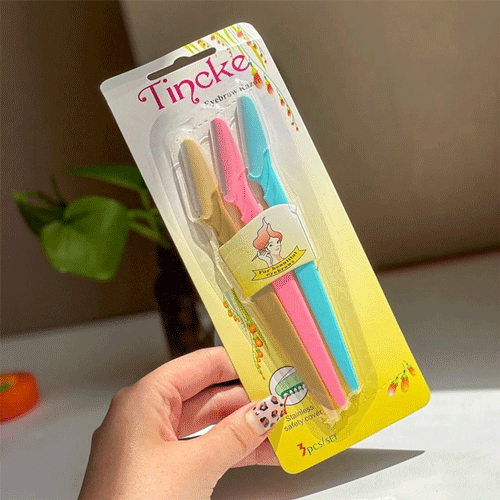 Tinkle Eyebrow Razor - Tan Pink Teal Blue