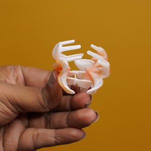 Glossy Plumeria Flower Shape Hair Clip - Orange