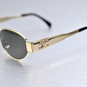 Women Oval Shape Metal Frame Sunglass