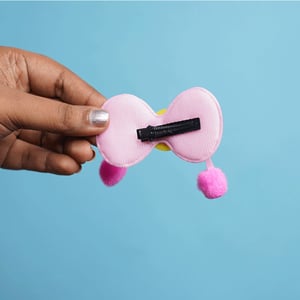 Shiny Stone Finish Bow Shape Pompom Hair Clip - Light Pink