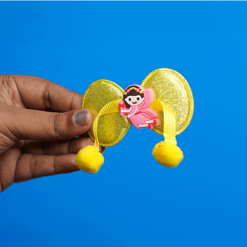 Shiny Bow Shape Pompom Hair Clip - Yellow