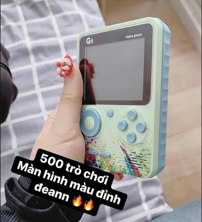 Máy chơi game cầm tay với hơn 500 trò chơi👏