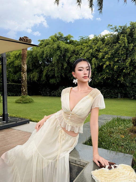 Set áo cánh tiên + chân váy brand OBIBI
