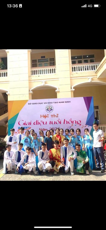 Áo dài nam phối trắng xanh dương