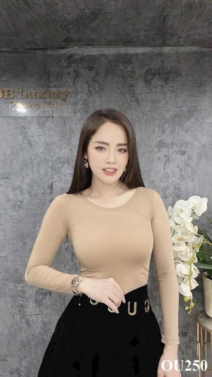 Áo Giữ Nhiệt Nữ Chất Liệu Sợi Chuyển Nhiệt Siêu Mỏng Giữ Ấm