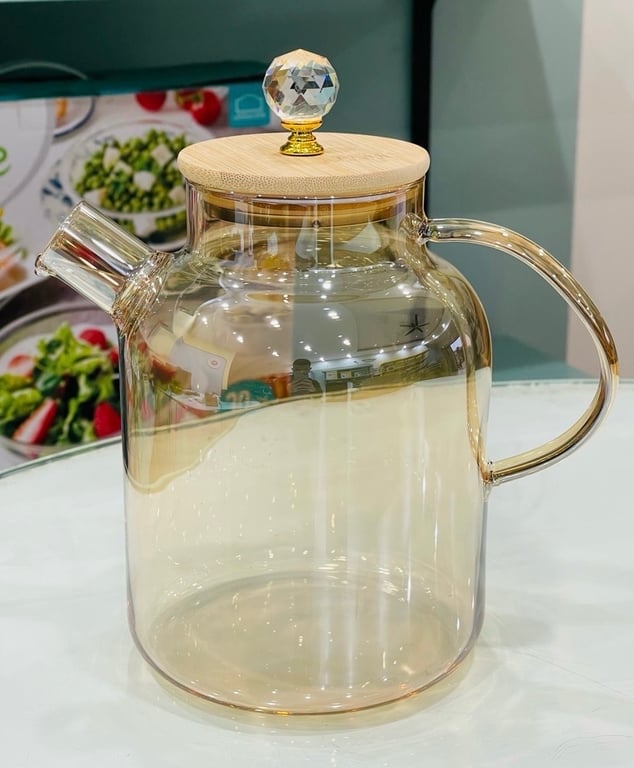 Bình này là thuỷ tinh chịu nhiệt, đun đc trên bếp.