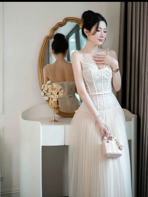 Đầm thiết kế nơ eo Chouchou ( size s )