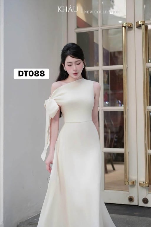 Váy kem cột chéo tay dài Khâu
