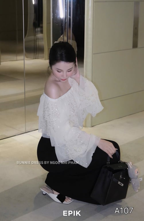 A107- áo trễ vai kim sa